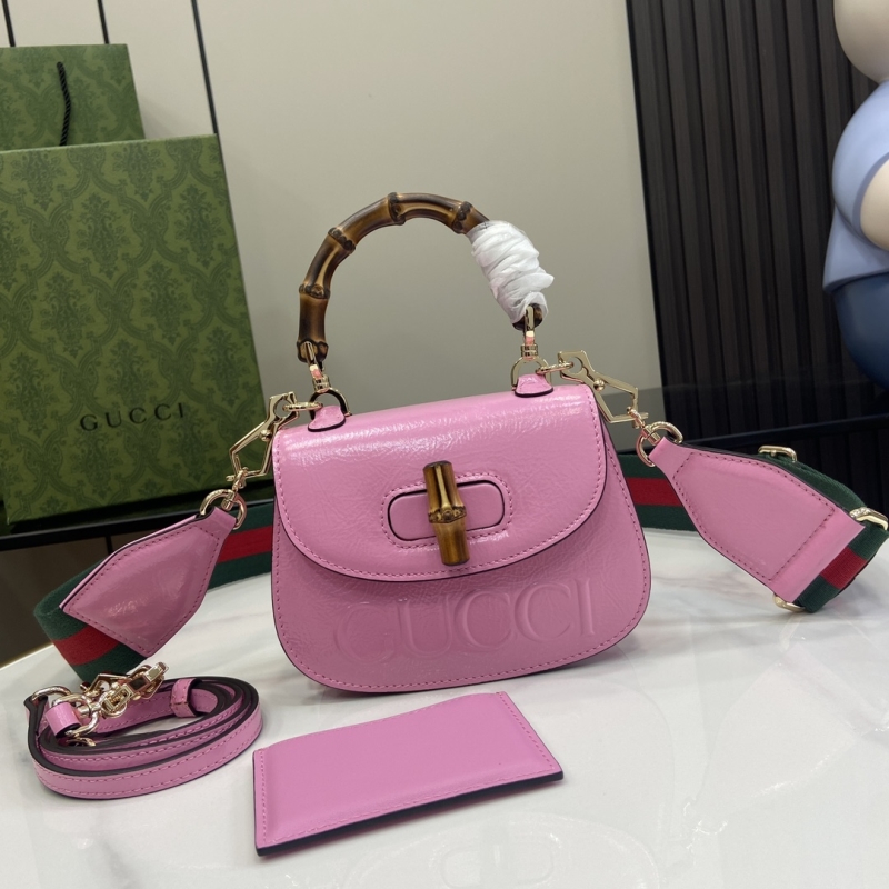 G*u*i top handle bags